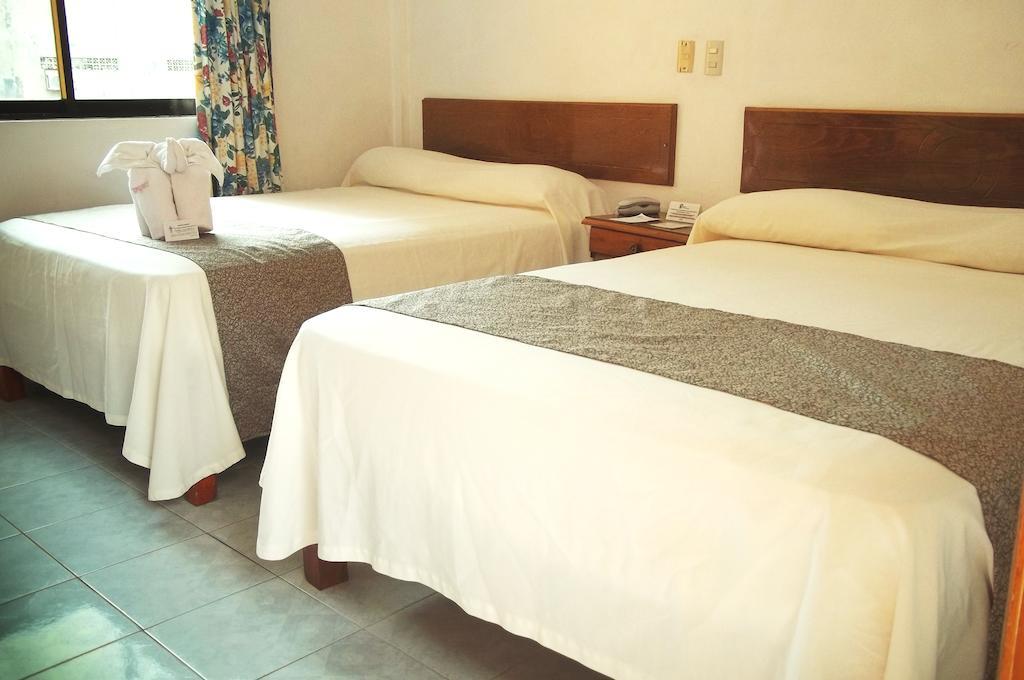 Hotel Arcos Del Parque Acayucan Chambre photo